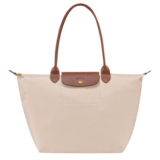 Bolso Grande Premium, Papel